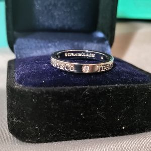 Authentic Tiffany & Co. 3mm Band Ring with 3 diamonds.
